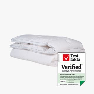 Disa lämmin untuvapeitto valkoinen